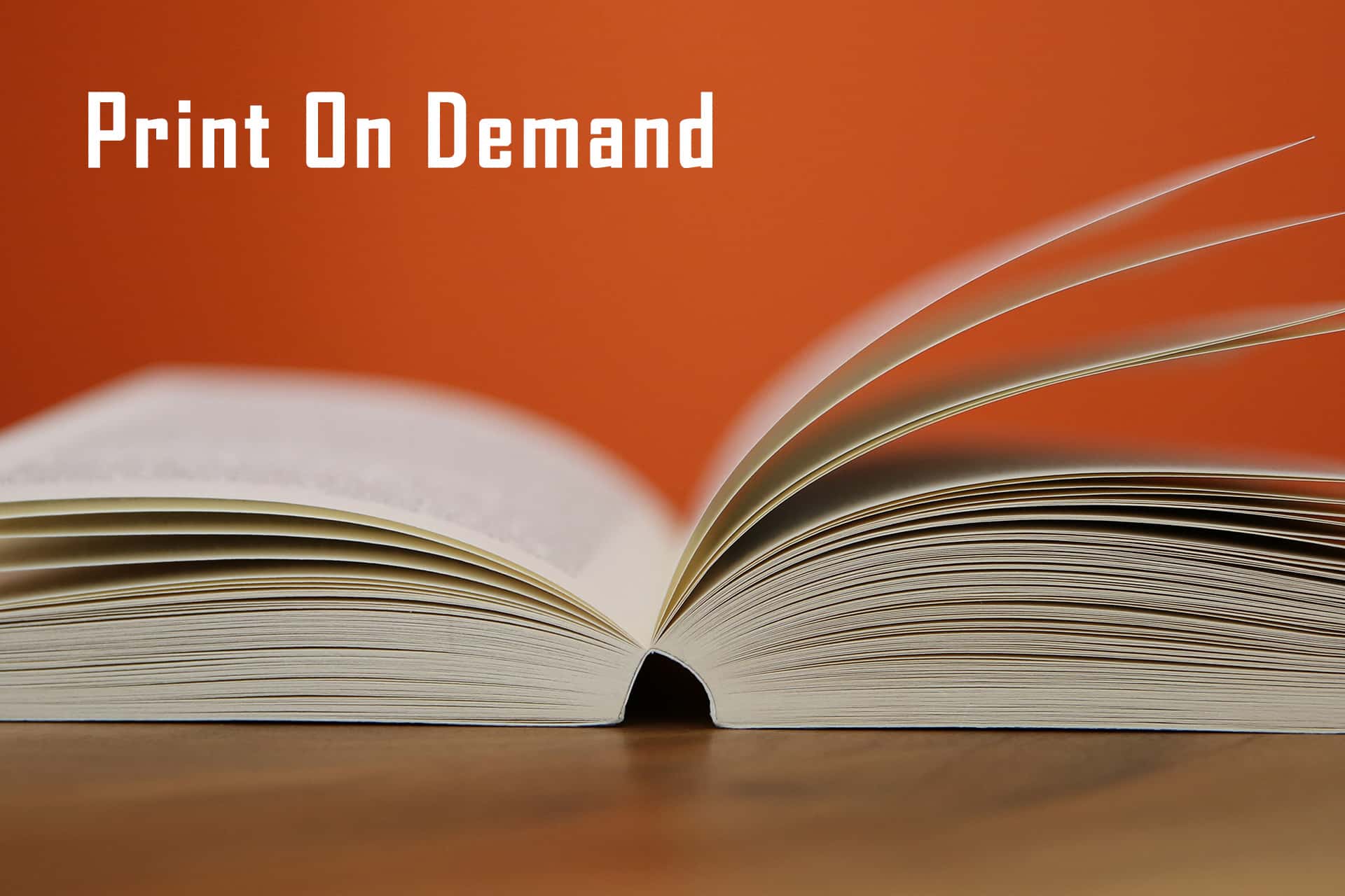 開いた本と「Print On Demand」の文字